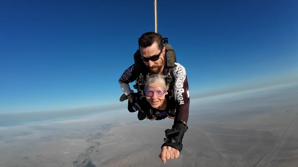 tandem skydiving freefall over Namibia desert relaxed first time skydiver