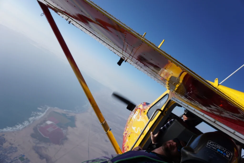 View past the pilot toward the Atlantic coast skydive route below