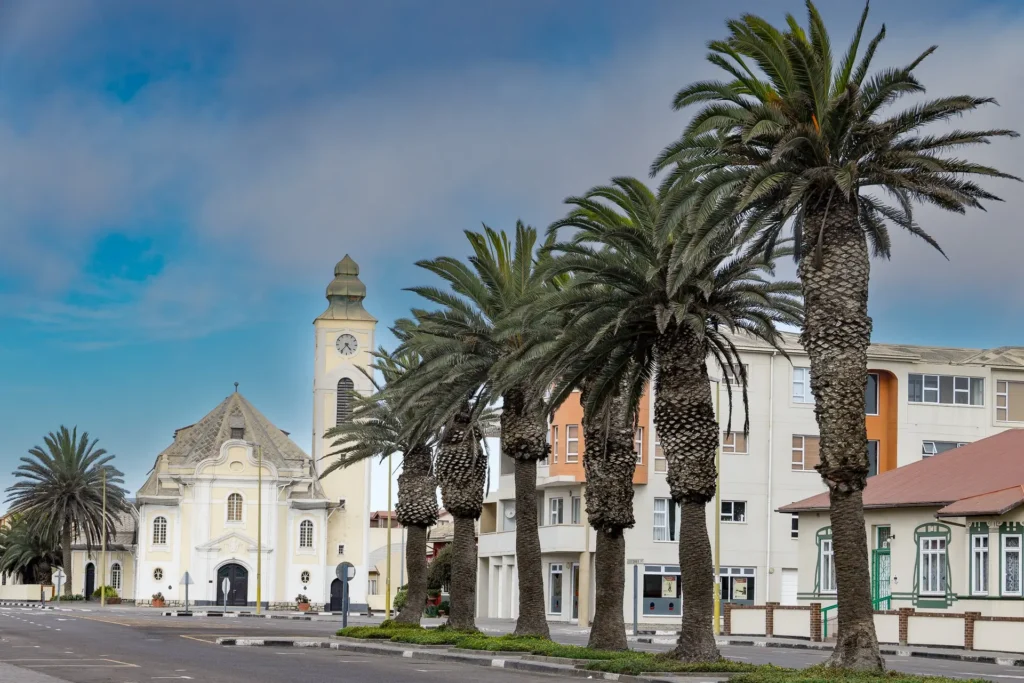 Historic church and palm-lined street in central Swakopmund