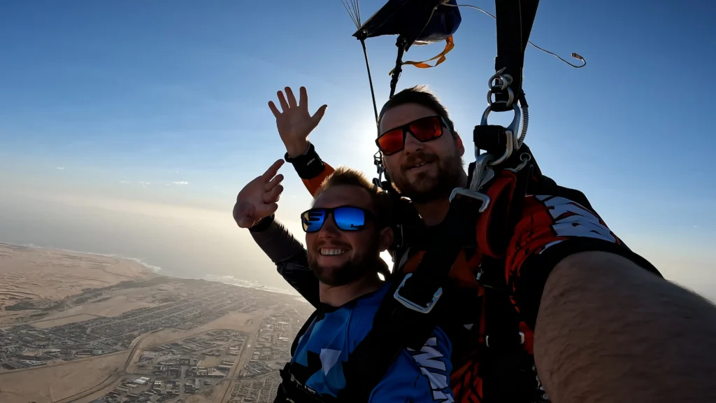 tandem skydive over Swakopmund coastline with ocean and desert below